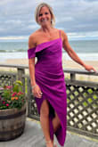 Loved wearing this dress!  I am an athletic build who typically wears a small - but I needed to size up for my waist/back. 
The side slit and unique asymmetrical top added flare and dare I say sexiness to this dress.  The touching hides the mid section slightly. It's not a lightweight fabric so I wouldn't recommend for a hot summer day!
Overall I would absolutely recommend. - Joann G.