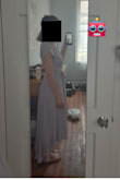 I bought a size down (small) because I have a small chest. It was slightly too tight on the ribs but it loosened a bit with wear. I loved the way it hung and it's a well-made dress. I did briefly and unsuccessfully try to pin it to make it slightly less revealing when I bend down. I think this is something that is probably possible in the right hands. Also, the sleeves were perfect and didn't make me sweat all over the place. - Yona R.