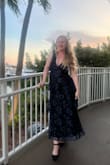 This def runs large. I'm always an M with Lulus...but I read the reviews and ordered both M and S. SO glad I did. The M was huge and the S fit perfectly for my event. It's a classy dress for a black tie occasion. Also, the length is perfect if you're like me and do not have time to have a dress altered/shortened!! - Sarah B.