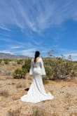In love with the dress, it fit perfectly! It was perfect for my Las Vegas wedding in the desert. The lace fabric is very forgiving, it helps hide my mommy pouch. The dress was a bit long for me but 3-inch wedges helped with the length. I didn't like that the inner lining was not sewn onto the lace, like other reviews suggested I had used magic hemming tape to tape the inner lining to the lace. The dress can be worn with or without a bra, and it does not have any support but I opted not to use one. - Yaritza M.