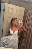 I wore this dress for my bridal shower and it was AMAZING. I've never gotten so many compliments on a piece of clothing. It almost made me want to elope and wear this as my wedding dress! - Lyndsay D.