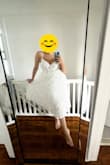 I loved this dress. I got so many compliments and felt like a true flower girl. I wore this for my godparent's white party for their 50th anniversary and it made me stand out.
This dress is fun, cute, and sexy, color is pure white. Has a glamour, and vintage touch, and flower trims flow with every movement. The only con for me was that this dress is very seen see-through in the skirt area so make sure to pair it with an undergarment or shorts.
I didn't have to wear a bra even though I am 34DD because the top is very supportive and covers the breast area. LOVE THIS! I would recommend this dress if you are interested in making a memorable one. This dress could be perfect for any bridal activity. - Anais G.
