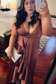 I got SO many compliments on this dress at a formal wedding this past weekend. I waited almost a year to order it - had breast reduction last year and never would've been able to wear something like this before. It definitely is a bit low cut and I almost decided not to wear it due to the cleavage, but after we worked some magic with safety pins, I felt more comfortable/confident. The color and material is even more gorgeous and luxurious in person. Truly loved this dress and can't wait to find an excuse to wear it again. - Amanda H.