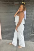 Loved loved loved this jumpsuit! It extenuated all my curves and I received so many compliments. The top does run a bit large. - Xenia M.