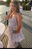 I purchased the large for my sister's engagement party. I really liked that this dress was a very unique-looking dress, and I received a lot of compliments. - Patricia P.