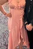 I purchased this dress for my sister to wear, and it fit her perfectly. She looked beautiful and received a lot of compliments the color complemented her skin very well. - Patricia P.