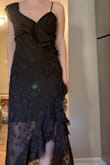 I ordered a size small and it fit perfectly. The fabric was breathable yet sturdy and it didn't feel tight after eating either (wore this to a wedding). I'm on the shorter side so I did not expect it to look like how it looks on the model who seems to have longer legs. The inner part of the dress came down to a little above my knees. However, with a pair of gold strappy heels (also purchased from Lulus), it worked just fine. Even with heels, the bottom of the dress just met the floor but I didn't feel like I was dragging it around all night or anything like that. It was unique and formal. I got a lot of compliments! - Olivia K.