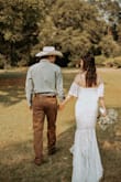 I ordered this dress hoping that it would fit directly from the box, and it did! I was able to wear cowgirl boots with no alterations to the bottom of the dress. Exchanging sizes to find the perfect fit was so easy! - Katherine H.