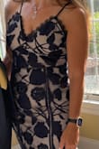 I received so many compliments in this dress. I bought a small and it fit perfectly including the length. The dress was well made. The only exception is that there is no padding so I had to use tape to hold up my breasts. - Debbie M.