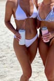 I've always been very skeptical about ordering white bathing suits & but this one was perfect! Bought it for my bachelorette party. It's was not see through. - Lauren L.