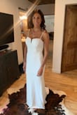 For a $100 dress, this is beautiful. It's silky and drapes like a nightgown. The fabric is nice enough and the seams are straight and lie flat (not always a thing with inexpensive dresses.) it's rather unforgiving so you may need to have the Spanx ready. - Nicole M.