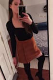 It was a little longer and larger than I expected but that actually worked out really well when it came to sitting down. I love the look, especially with thigh-highs. It's a fun skirt! Perfect for a cold weather date night. - Jennifer M.