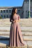 Beautiful, flowy dress that had a unique cut along the waist. The color is very elegant and the material feels expensive! It fit really well. I did have to wear very high heels so the dress didn't drag on the floor, I personally didn't mind that but just bear in mind that its a tall dress! - Azka R.