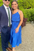 This dress was very cute and I received many compliments. While the strap is adjustable, the top portion was a little loose on me. I am a B, but if you were bigger chested I think it would fit perfectly. - Jaclyn P.