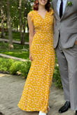 This dress is long. I'm 5'9 and it still almost hit the floor with clogs on. I'd recommend it for my long legged girls! the fabric was nicer than I expected. It poured rain & wasn't see-through at all. - Emily M.