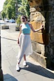 I received this gorgeous skirt quickly. It arrived beautifully packaged but I worried it would wrinkle on my transatlantic flight. It wrinkled a tiny bit but looked SO cute and flowy on!!! Absolutely perfect for my vacation/graduation vibes! - Sarah G.