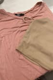 Love this top as it can be worn in a business setting or casually with jeans or shorts. The top I ordered was supposed to come in top but it's definitely more of a pink color than a brownish gray.

Photo taken with a taupe crop that I own. - Regina T.