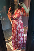 This is the best fitting dress I've found from Lulus. The wrap style really complements my curvy figure at it allows it to be adjusted tighter or looser according to my needs. The cleavage area is not too open but open enough to still be sexy. The fabric is soft and light and the color and pattern are beautiful. I've had a hard time finding dresses that work with my big boobs and this one is it. I also tried the XL  and it was too big. Only thing is  that is too long. I don't wear heels so I'm going to have to hem it. Other than that is perfect! - Melina C.