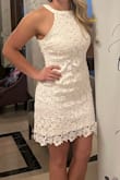I wore this for my rehearsal dinner and it was absolutely perfect! Sizing was great and it fit like a glove. Dress doesn't have much give or stretch, so make sure to really look at sizing on this. Fabric was more of a 3D crochet feel and was really pretty. - Haley D.