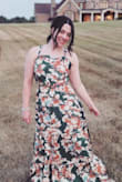 This dress is so elegant and comfortable. You can determine how high the neck is by how tight you tie it in the back. It also accents your waist beautifully. Fabric is nice- good quality. I'm naturally curvy at the hips and this dress was the perfect choice. If you want to feel great and look great at your special occasion,  this dress is for you. Loved it and can't wait to wear it again. - Maddison S.