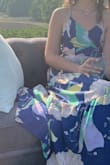 This dress fit the summer wedding vibe perfectly. It was flowy, light, and such a pretty pattern. The back is really the best part of the dress. I'm on the taller side and this dress hit above my ankles, so I think that it would be short friendly. - Emily M.