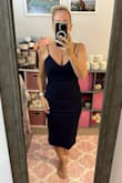 I love everything about this dress. The fit is amazing. I usually wear a medium, and I ordered a medium, and it fits really well. The material is thick and a little stretchy, so it hugs you in all the right places without being too tight. I'm 51 years old. If I were 15 years younger I might even order a small for a super snug fit, since it does have a nice stretch. - Christine B.