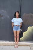 I love this top! It's super cute-sy yet sophisticated... Simple yet unique... Fits well and I always get compliments when I wear it. Requires a bit of ironing after washing but it's well worth the effort in my opinion. It's good quality & I'm so satisfied with my purchase. - Abosede O.
