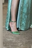 Love them. Comfortable to wear & walk in. The satin is so pretty. The heel is comfortable to walk in compared to most heels. The color is like two shades darker than they appear online though. But still really pretty. I had brought them to wear with a matching dress. The dress did it fit. But I like the shoes so much I kept them. - Lisa F.
