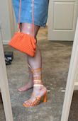 It's really pretty. It's true to color as it appears online. I like the size & the length of the straps. I gave one less star due to quality. It feels like the material will crack & rub off with use & or time. Other than that I like the purse really cute. - Lisa F.