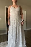 Being shorter, it needs to be hemmed a smidge, but otherwise it fits amazing. I usually am a medium/large & initially ordered a large, so I had to size up but I cannot wait for my wedding day to wear this!! - Miranda J.