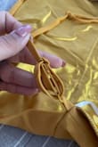 I initially ordered a medium, felt tight  so I exchanged it for a large and the replacement they sent me is sewed incorrectly so it's not adjustable in the straps included photo of a correct strap and the other faulty strap. Now I cant even wear this because it's not adjustable. - Britney U.