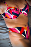 I love the way this top fits.  I don't have much at the top so if it can be accentuated a little is a nice thing.  I love everything I buy from Lulus.  They never disappoint.  Also, I'm 61 and I think it has flattering colors. - Joyce H.
