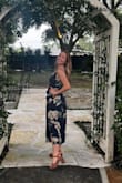 This dress was so comfy and fit well. Adjustable straps were perfect and the slit made dancing easy. The fabric is also very high quality. - Chantelle R.
