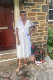 I absolutely ADORE this dress! It's so elegant- the details in the lace are very high quality, I felt like a million bucks and I got so many compliments! I would recommend sizing down, the dress runs large and is very low cut in the front and back. I didn't have time to exchange it before my shower so I had to put a few stitches in the front. - Lorrie H.