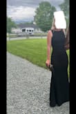Purchased this dress for a black tie optional wedding. I am 5'5 and wore 4" heels and the length was great (which is good because I would have had zero time to alter it as I was late purchasing). The material has some stretch and is very wrinkle resistant. (I did nothing to it other than take it out of the bag it arrived in and hang it in a closet for a week.) I wore an adhesive bra due to the open back. I have smaller boobs (32C) and I'm not sure you could have fit much larger than that into the XS. - Tiffany S.