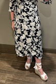 These shoes were the perfect addition to the dress I wore to my friend's wedding. They were a little loose in the back and the strap kept slipping down my heel, but it may just be that I didn't tie them tight enough. I'm 5'7" and I swear I felt 6' tall. I was able to wear them for hours and didn't have foot pain the next day. I'm terrible in heels and these wedges were amazing! They were perfect and I can't wait for the next event that I can wear them to. - Cheryl S.