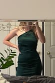 It fits nice and is relatively comfortable for a tighter dress. The green colour is really nice and dress makes me look curvier. Would definitely recommend. - Alyssa M.