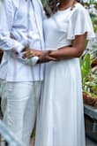 This dress is very flowy and pretty - it was perfect for my engagement photos. 4 Stars because it runs very long - I had to have it altered which was disappointing because it ended up costing almost as much as the dress. - Lorrie H.
