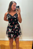 A tad loose around the bust as to be expected from other reviews. But such a pretty and delicate dress! I love the embroidery on this! I'm almost 5'2, and she's a little short in the back but thats normal cause I got some booty. Love this nothing bad to say at all - Alli C.