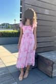 Wore this for my birthday and it's soooo cute! It gives garden tea party vibes and I felt like a princess wearing it! Only small thing is that the part below the bust flared out at the sides a bit due to the back cutout I believe, but it wasn't noticeable or uncomfortable at all. Overall super pretty and would highly recommend - Mashal M.