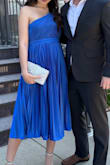 Bought it for a wedding ! Fabric is absolutely for traveling , that dress was in a vacuum bag and no wrinkles AT ALL, so if you're looking for a perfect destination wedding guest dress - this is it ! I was also 23 weeks pregnant at the time - got a medium (normally I'm a small) , super comfy and not hot ! - Olha B.