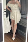 It's not as white as I thought, but still stunning. I'm wearing it as my reception/dancing dress for my wedding. Such a cute find! And flatters the body - Alexandra C.