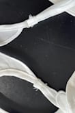 Dress came with several frayed edges on the straps. I've reached out to customer service and sent photos but never received a response. - Nancy L.