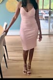 The dress fits beautiful. Material is not thin and the quality is great. - Gissell C.