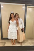 I wore this for my bridal shower and got a ton of compliments. The dress is so bridaly- it fit perfectly and is very elegant. The straps are adjustable too which helped. I loved the fit. It was tight - it was super comfortable. And it was a perfect day - Kristin G.