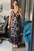 This dress is so comfortable. It fits as I expected. I like that it is longer and that I can still move in it. Great purchase! - Joslyn M.