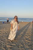 I loved this dress! I'm usually a large but ordered M. It fit perfect , perfect for a beach wedding guest dress. I'm very picky when it comes to material due to hot Texas weather this dress was nice and fresh. - Astrid A.