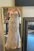 I LOVE this dress!!!!! It fits perfectly! I don't need to get a bra or a bodice for this dress it holds everything in very well. Pictures do not do it justice, in person, it's GORGEOUS and so sparkly!! I can't wait to wear this for my big day! - Savannah L.