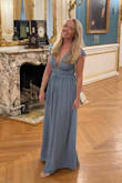 I'm obsessed with this dress. It's so flattering and sexy, but not too sexy. I wore this in the light blue for a rehearsal dinner and another wedding and received so many compliments. One thing is I had to fashion tape the chest area so the girls didn't pop out. I will definitely be getting another color this year! - Laura C.