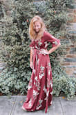 I got this for a fall wedding, and I ordered a medium because I'm usually a S/M and it was definitely too big, but because it's a true wrap dress I was able to tie it tight and make it work! Heavy material, so comfortable, and very flattering! - Laura C.